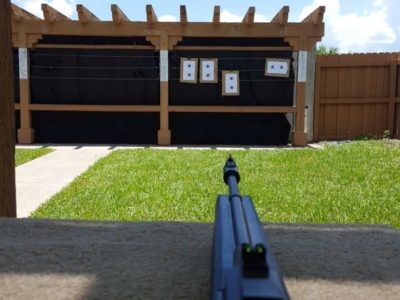 Officers Compete with Villagers In Marksmanship Competition