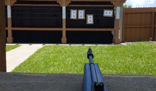 Officers Compete with Villagers In Marksmanship Competition