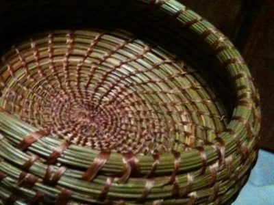 Local Artisan Collects and Weaves Baskets Out of Pine Needles