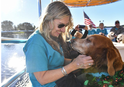 Therapy dogs cruise on Lake Sumter